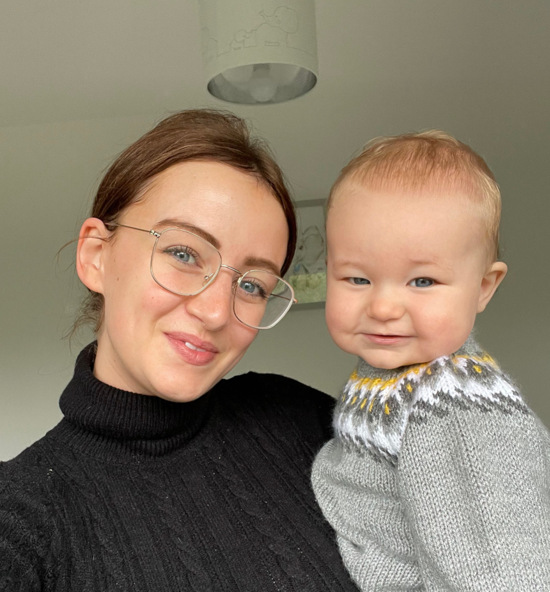 Happy mother and baby smiling